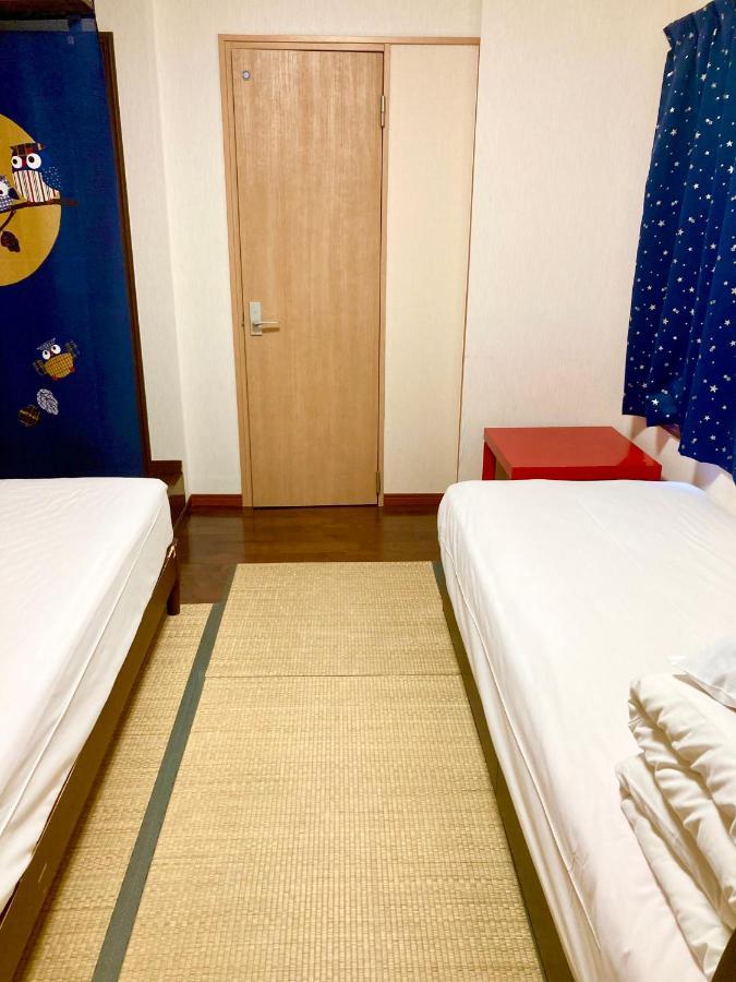 Guest House Izumi Esterno foto