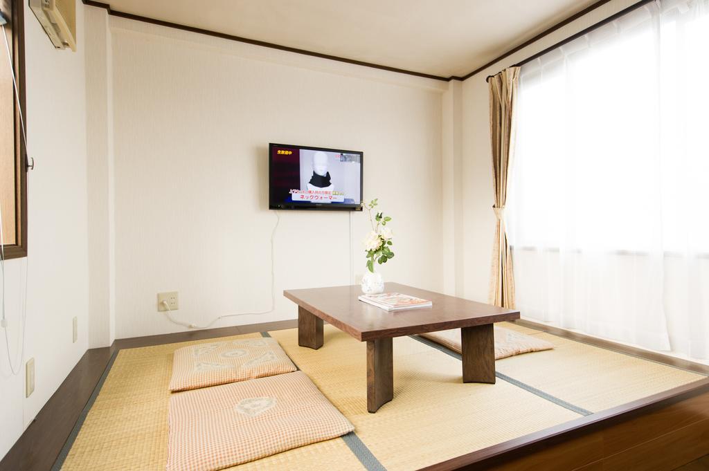 Guest House Izumi Esterno foto