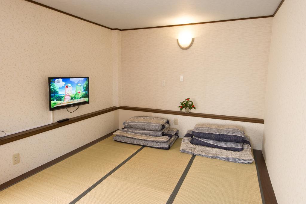 Guest House Izumi Esterno foto