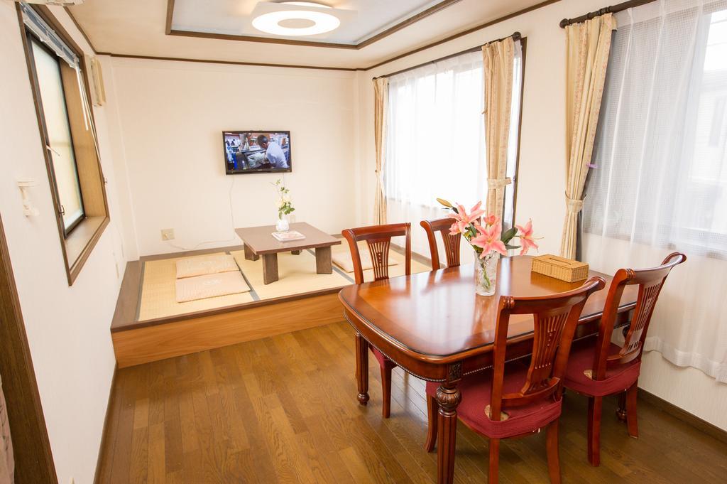Guest House Izumi Esterno foto