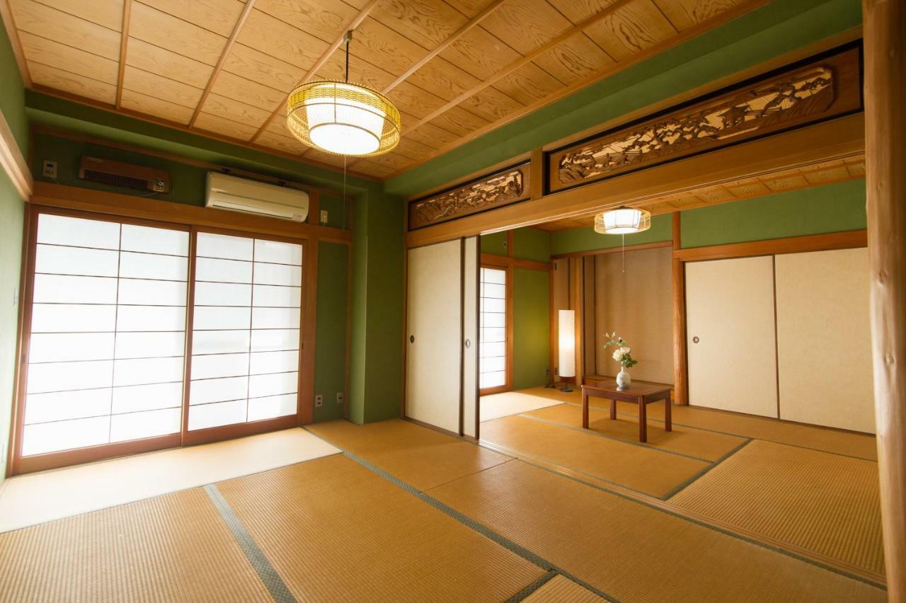 Guest House Izumi Esterno foto